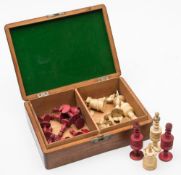 A late 19th century Indian stained bone Barleycorn style chess set:, in an associated wooden box,