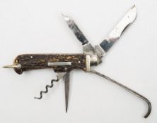 A late 19th/early 20th century antler handled combination pocket knife by Weiss & Co, London:,