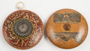 A 19th century German treen Yo-Yo with transfer decoration:,