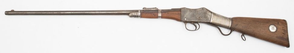 An Omani white metal mounted Martini Henry action sporting gun,