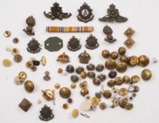 A collection of WWI and WWII buttons, cap badges and shoulder flashes,: etc.