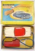 Marx Toys (UK) a Battery Operated 'Electric' car:, white plastic body with red roof and interior,