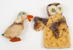 A Steiff plush owl hand puppet and a Steiff plush duck: (2) (owl lacks button).
