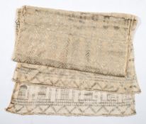 A 1920s Art Deco cream net and hammered silver Assuit Egyptian shawl:,