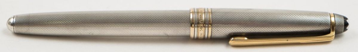 A silver Mont Blanc Meisterstuck fountain pen:, stamped 950 to cap with gilt clip and bands,