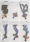 A group of six Third Reich period Cross Of Honour of the German Mother:, with ribbons.