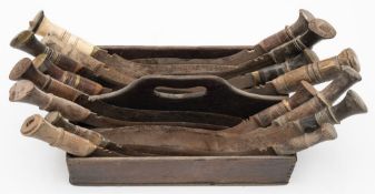 A group of sixteen various kukris contained in an associated oak cutlery box:.