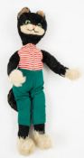 A Steiff plush anthropomorphic black cat:, green glass eyes, stitched nose and mouth,