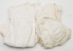 A Victorian cotton and laced edged blouse: a night dress and an apron.