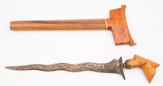 A 20th century Malaysian kris:, of typical form circa 1946, blade length 32cm.