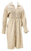 A 1941 Utility 'Aertil' white polo shirt:, a pair of 1940s Umbro white sports shorts,