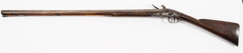 An 18th century flintlock sporting gun :, the 34 inch plain barrel signed 'W Morris,
