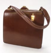 A Straeter 'Lite-On' brown leather handbag:,