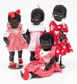 Various makers, four large plastic Negro girl dolls:, each approx 53cm. high.