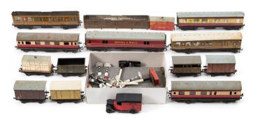 A group of Dinky road signs together with a collection of miscellaneous OO/HO scale rolling stock,