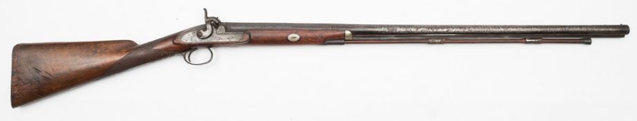 A 19th century English percussion cap fowling gun:,