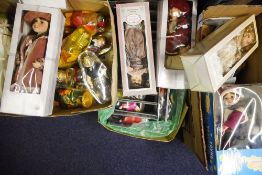 A collection of porcelain and other dolls:, some in national costume, some boxed. (a lot).