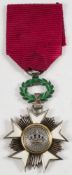 A Belgian Order of the Crown Commander Knights Cross: (lacking some blue enamel) and a silver gilt