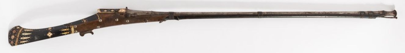 A late 19th century Indian ebony and ivory mounted matchlock:,