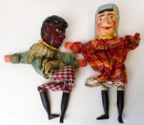 Two early 20th century wooden headed hand puppets 'Mrs Punch' and 'Jim Crow':,