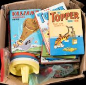 A box of children's annuals:, marbles and assorted postage stamps.