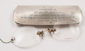 A George V silver glasses case with WWI presentation inscription to cover:,