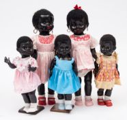 Various makers, five assorted plastic Negro girl dolls: 40 and 52cm. high.