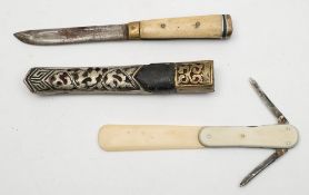A Middle Eastern bone handled dagger:, the short blade over a plain hilt with bone and horn grip,