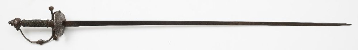 A mid-17th century English rapier:, the straight single edge blade over double embossed shell,