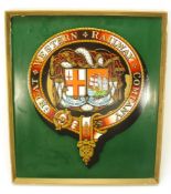 A GWR carriage emblem on a framed panel:, 50 x 44cm.