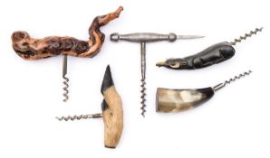 A group of five various corkscrews:, comprising a deer slot handled example,