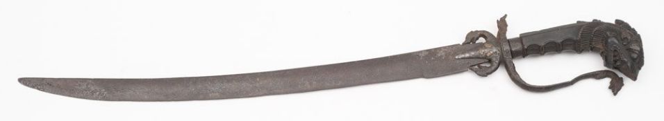 A 19th century Cingalese kastane:,the single edged curved blade with pointed langets,