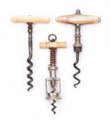 An early 20th century bone handle miniature spring twin pillar perfume bottle corkscrew:,