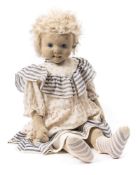 An early 20th century Steiff doll, circa 1910:, blonde hair over felt head with central seam,