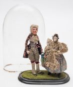 Two early 20th century costume dolls under glass dome:,
