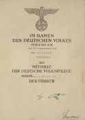A WWII German Social Welfare Decoration Certificate:, for Erna Engmann dated 6th September 1943.