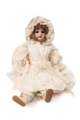 A Limbach 'Wally 6' bisque head doll:, brown wig, brown glass sleeping eyes,