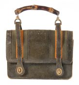 A vintage Gucci green leather handbag:, with bamboo handle,