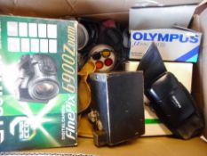 A Fujifilm 6900 Zoom digital camera:, a Canon 814XL electronic camera,