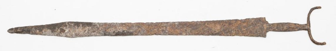 A rare late Hallstatt period sword:, flat double edged tapering blade, in excavated condition,