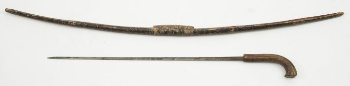 A 19th century hand decorated bow with polychrome floral motifs:, 119cm long,
