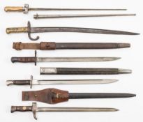 A group of five WWI bayonets,: comprising a Chassepot pattern bayonet,