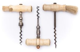 Three 19th century bone handled corkscrews:, two with brushes (3).