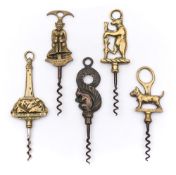 A group of five brass direct pull corkscrews:, including a Cornish Pixie example (5).