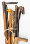 A small collection of miscellaneous walking sticks, riding crops and swagger sticks:,