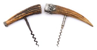 An early 20th century white metal mounted antler handled corkscrew:, with monogrammed cartouche,