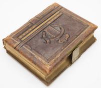 A Victorian leather bound musical carte de visite album:,