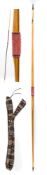 A horn tipped beech longbow:, unsigned 196cm long.