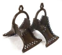 A pair of early 20th century Spanish brass stirrups:,