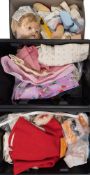 A collection of assorted dolls clothes: including shoes and accessories.